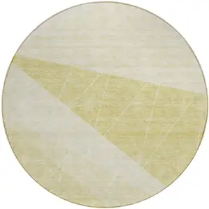 Photo of 8' Wheat Gold And Ivory Round Geometric Washable Indoor Outdoor Area Rug
