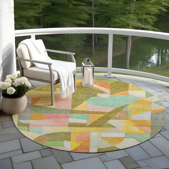 8' Wheat Orange Green And Ivory Round Abstract Washable Indoor Outdoor Area Rug Photo 6