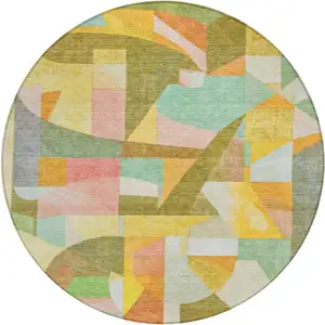 Photo of 8' Wheat Orange Green And Ivory Round Abstract Washable Indoor Outdoor Area Rug