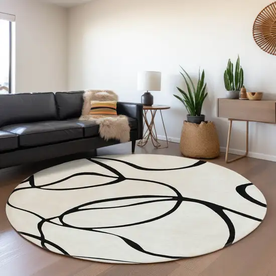 8' White And Black Abstract Washable Round Rug With UV Protection Photo 4
