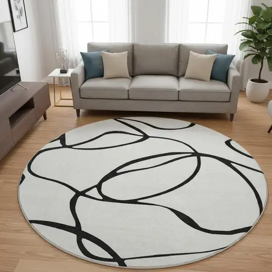 8' White And Black Abstract Washable Round Rug With UV Protection Photo 2