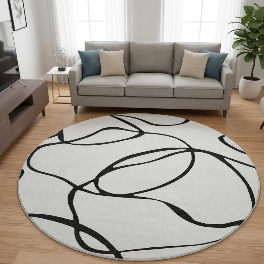 8' White And Black Abstract Washable Round Rug With UV Protection Photo 2