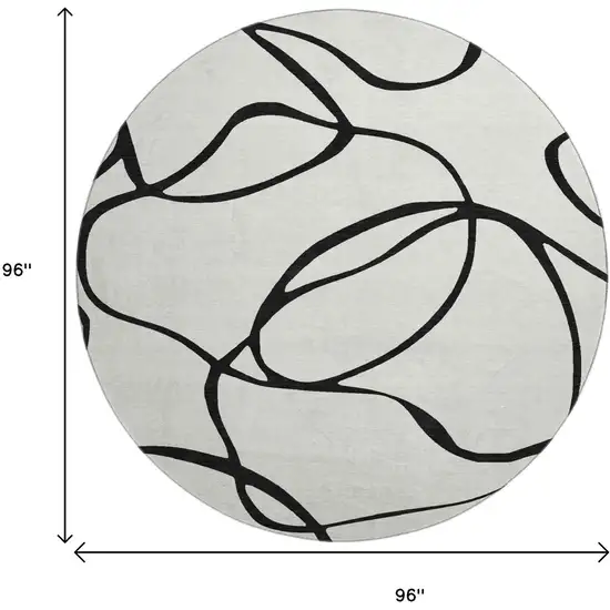 8' White And Black Abstract Washable Round Rug With UV Protection Photo 9