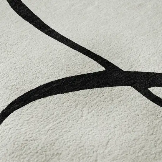 8' White And Black Abstract Washable Round Rug With UV Protection Photo 8