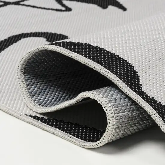 8' White And Black Animal Print Indoor Outdoor Runner Rug Photo 8