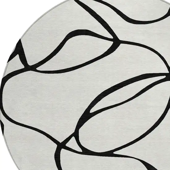 8' White And Black Round Abstract Washable Indoor Outdoor Area Rug Photo 4
