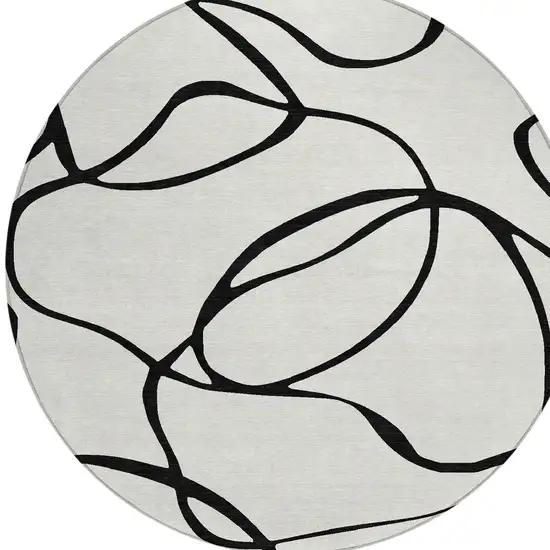 8' White And Black Round Abstract Washable Indoor Outdoor Area Rug Photo 5