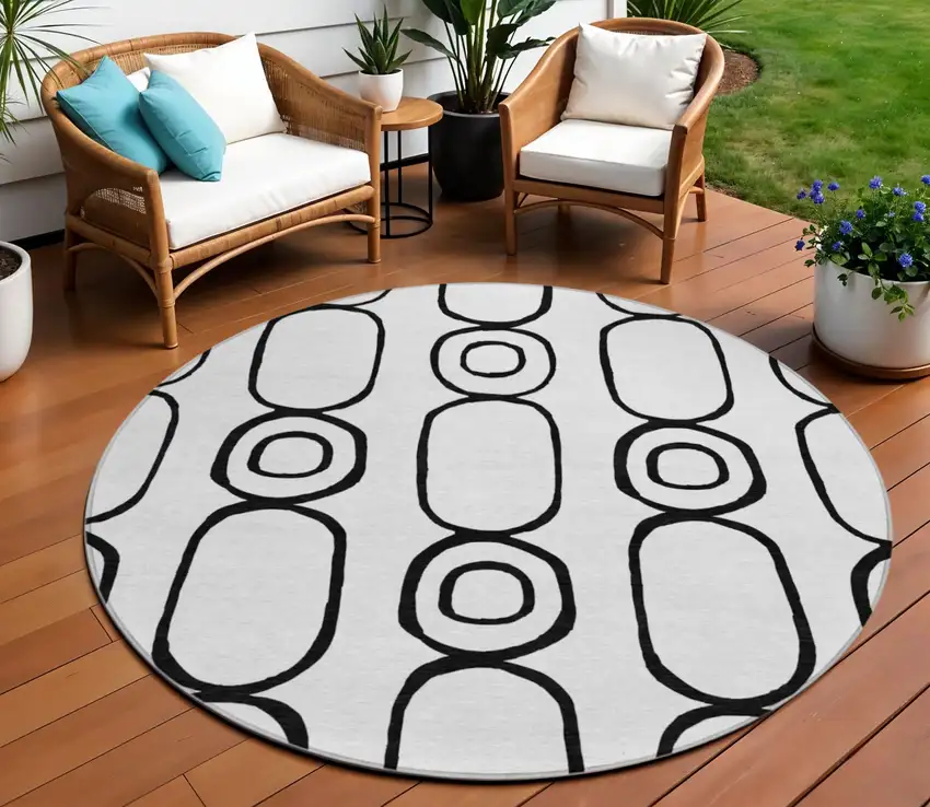8' White And Black Round Geometric Washable Indoor Outdoor Area Rug Photo 1