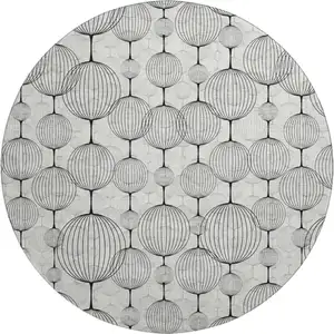 Photo of 8' White And Gray Geometric Washable Round Rug With UV Protection