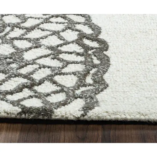 10' White And Ivory Wool Geometric Hand Tufted Round Rug Photo 6