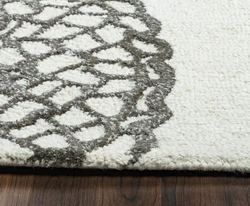 10' White And Ivory Wool Geometric Hand Tufted Round Rug Photo 6