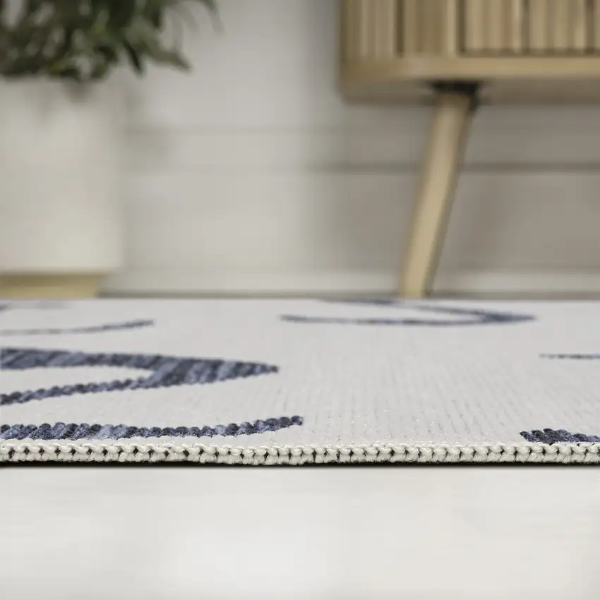 8' White And Navy Blue Animal Print Indoor Outdoor Runner Rug Photo 6