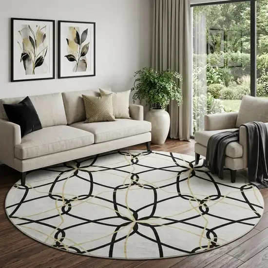 8' White Black And Gold Geometric Washable Round Rug With UV Protection Photo 1