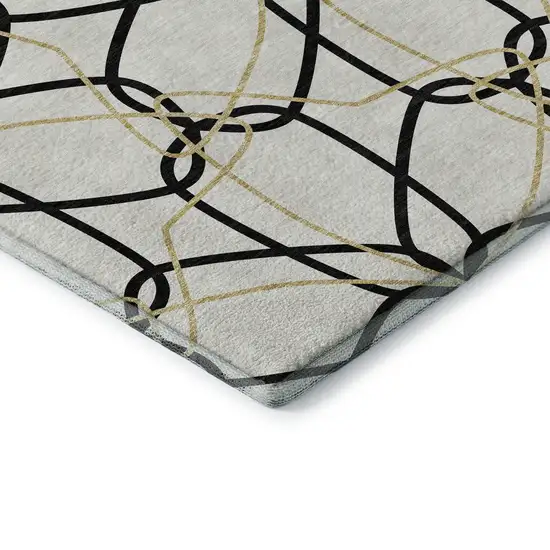 8' White Black And Gold Geometric Washable Round Rug With UV Protection Photo 6