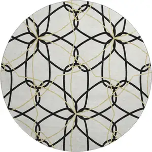 Photo of 8' White Black And Gold Geometric Washable Round Rug With UV Protection