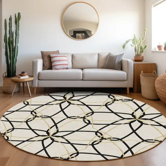 8' White Black And Gold Geometric Washable Round Rug With UV Protection Photo 4