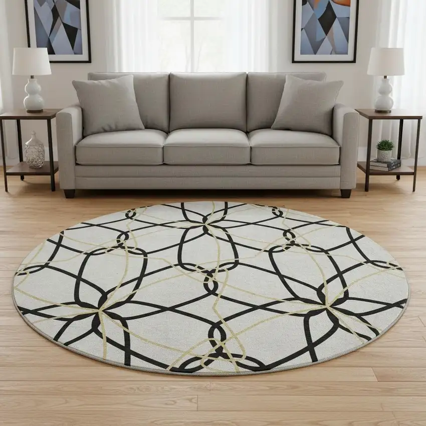 8' White Black And Gold Geometric Washable Round Rug With UV Protection Photo 2