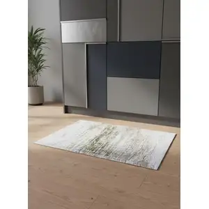 Photo of 5' White Gray And Green Abstract Washable Round Rug With UV Protection