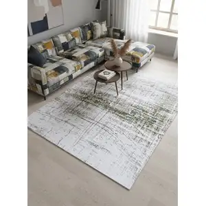 Photo of 8' White Gray And Green Abstract Washable Round Rug With UV Protection