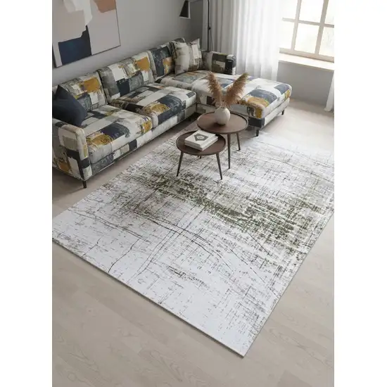 8' White Gray And Green Abstract Washable Round Rug With UV Protection Photo 1