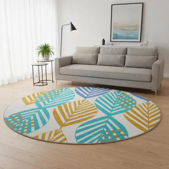 8' White Orange And Blue Floral Washable Round Rug With UV Protection Photo 2