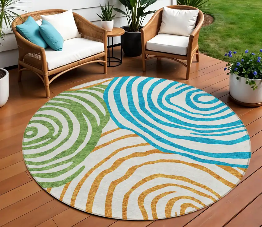 8' White Orange And Teal Blue Round Abstract Washable Indoor Outdoor Area Rug Photo 1