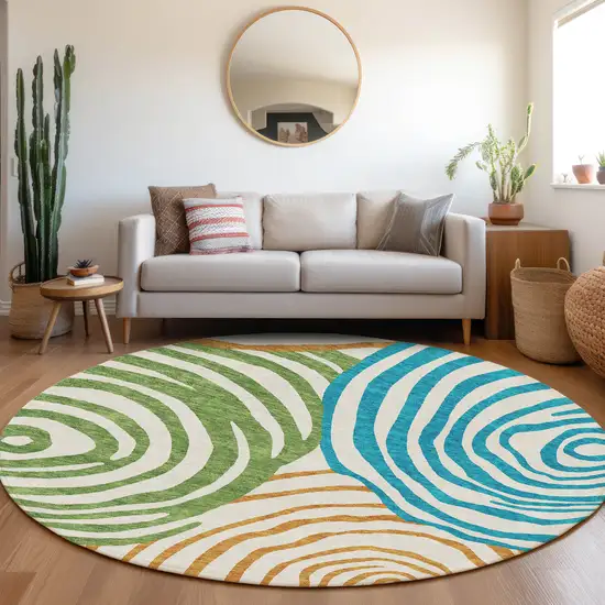 8' White Orange And Teal Blue Round Abstract Washable Indoor Outdoor Area Rug Photo 8
