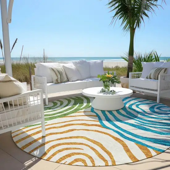 8' White Orange And Teal Blue Round Abstract Washable Indoor Outdoor Area Rug Photo 7