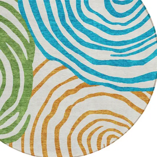 8' White Orange And Teal Blue Round Abstract Washable Indoor Outdoor Area Rug Photo 4