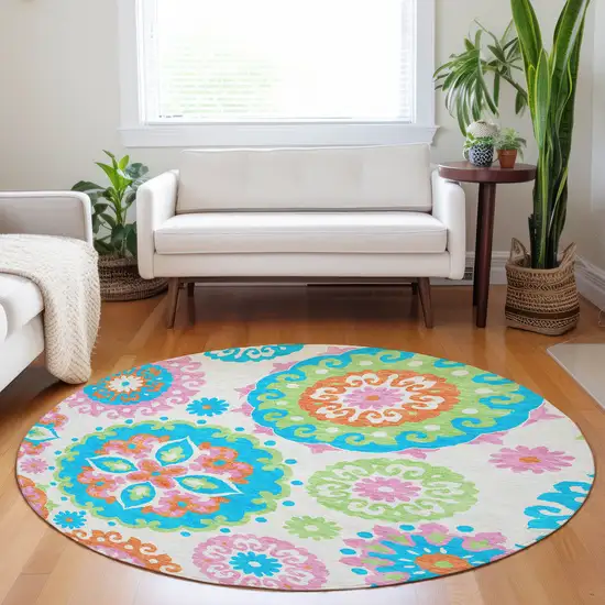 8' White Orange And Teal Medallion Washable Round Rug With UV Protection Photo 5