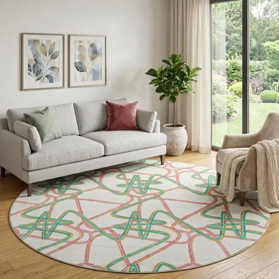 8' White Purple And Teal Geometric Washable Round Rug With UV Protection Photo 1