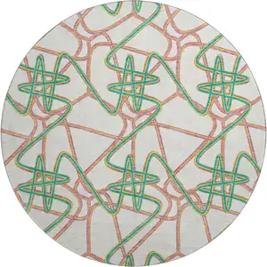 Photo of 8' White Purple And Teal Geometric Washable Round Rug With UV Protection