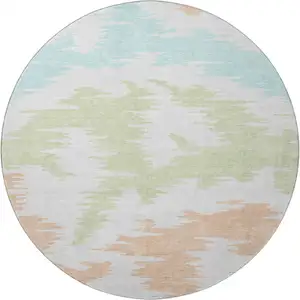 Photo of 8' White Sky Blue And Peach Abstract Washable Round Rug With UV Protection