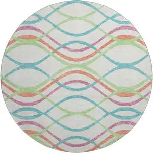 Photo of 8' White Teal And Green Abstract Washable Round Rug With UV Protection