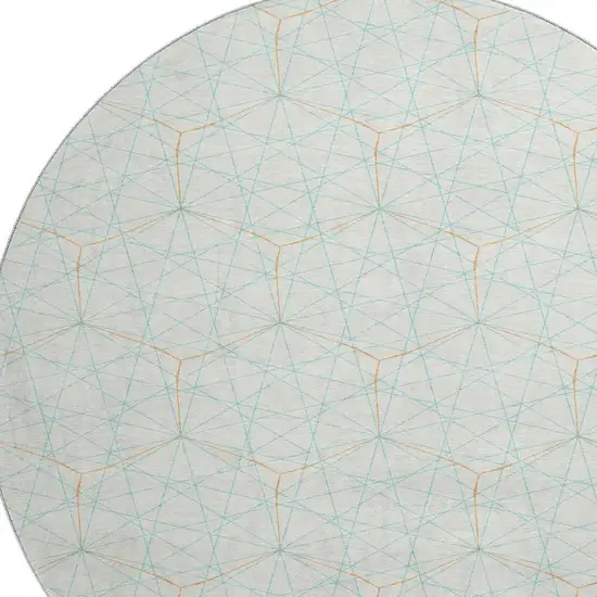 8' White Teal And Orange Geometric Washable Round Rug With UV Protection Photo 2