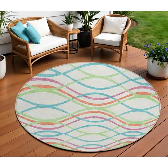 8' White Teal Blue And Lime Green Round Abstract Washable Indoor Outdoor Area Rug Photo 1