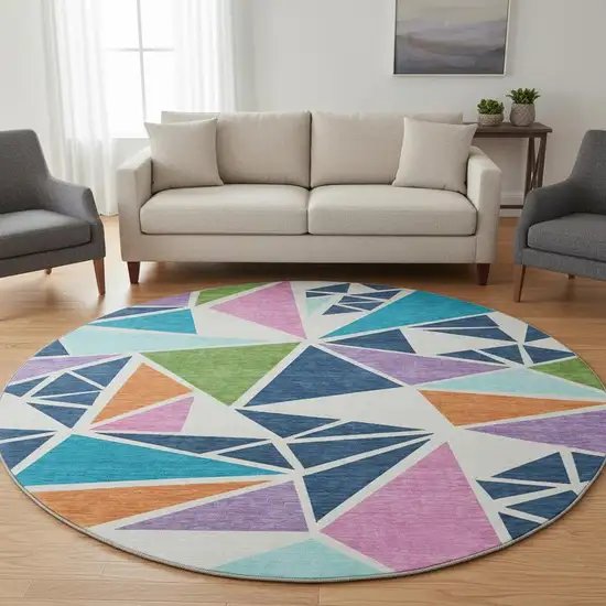 8' White Teal Pink And Orange Geometric Washable Round Rug With UV Protection Photo 2