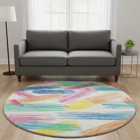 8' White Yellow And Pink Striped Washable Round Rug With UV Protection Photo 2
