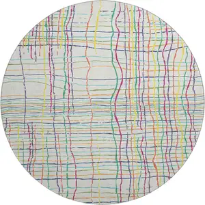 Photo of 8' White Yellow Green And Pink Striped Washable Round Rug With UV Protection