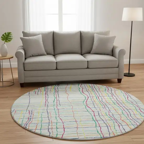 8' White Yellow Green And Pink Striped Washable Round Rug With UV Protection Photo 2