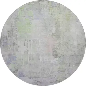 Photo of 8' X 8' Artichoke Green Gray And Purple Abstract Washable Round Rug With UV Protection