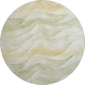 Photo of 8' X 8' Artichoke Green Ivory And Beige Abstract Washable Round Rug With UV Protection