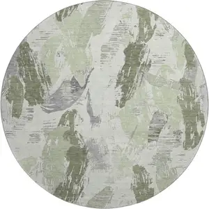 Photo of 8' X 8' Artichoke Green Ivory And Gray Abstract Washable Round Rug With UV Protection