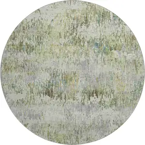 Photo of 8' X 8' Artichoke Green Ivory And Gray Striped Washable Round Rug With UV Protection