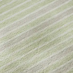 Photo of 8' X 8' Artichoke Green Ivory And Gray Striped Washable Round Rug With UV Protection