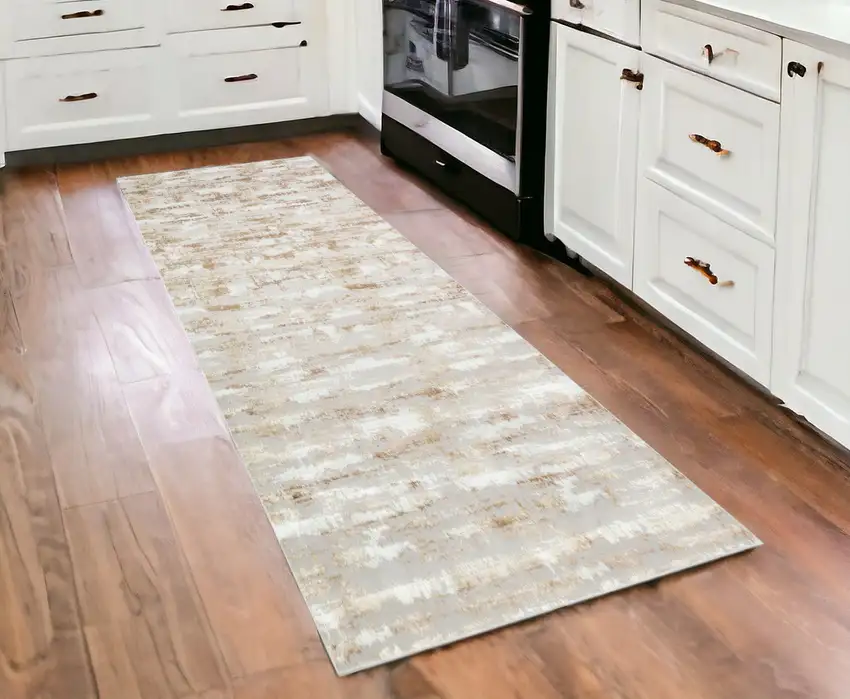 3' X 10' Beige Abstract Washable Non Skid Area Rug Photo 1