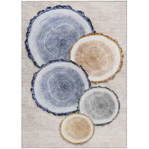 Photo of 3' X 5' Beige Blue and Gold Faux Bois Washable Non Skid Indoor Outdoor Area Rug