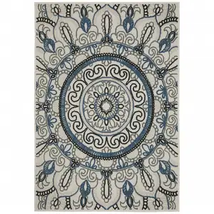 Photo of 6' X 9' Beige Geometric Stain Resistant Indoor Outdoor Area Rug