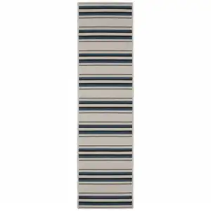 Photo of 2' X 7' Beige Geometric Stain Resistant Indoor Outdoor Area Rug