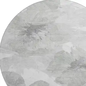 Photo of 8' X 8' Beige Gray And Ivory Floral Washable Round Rug With UV Protection